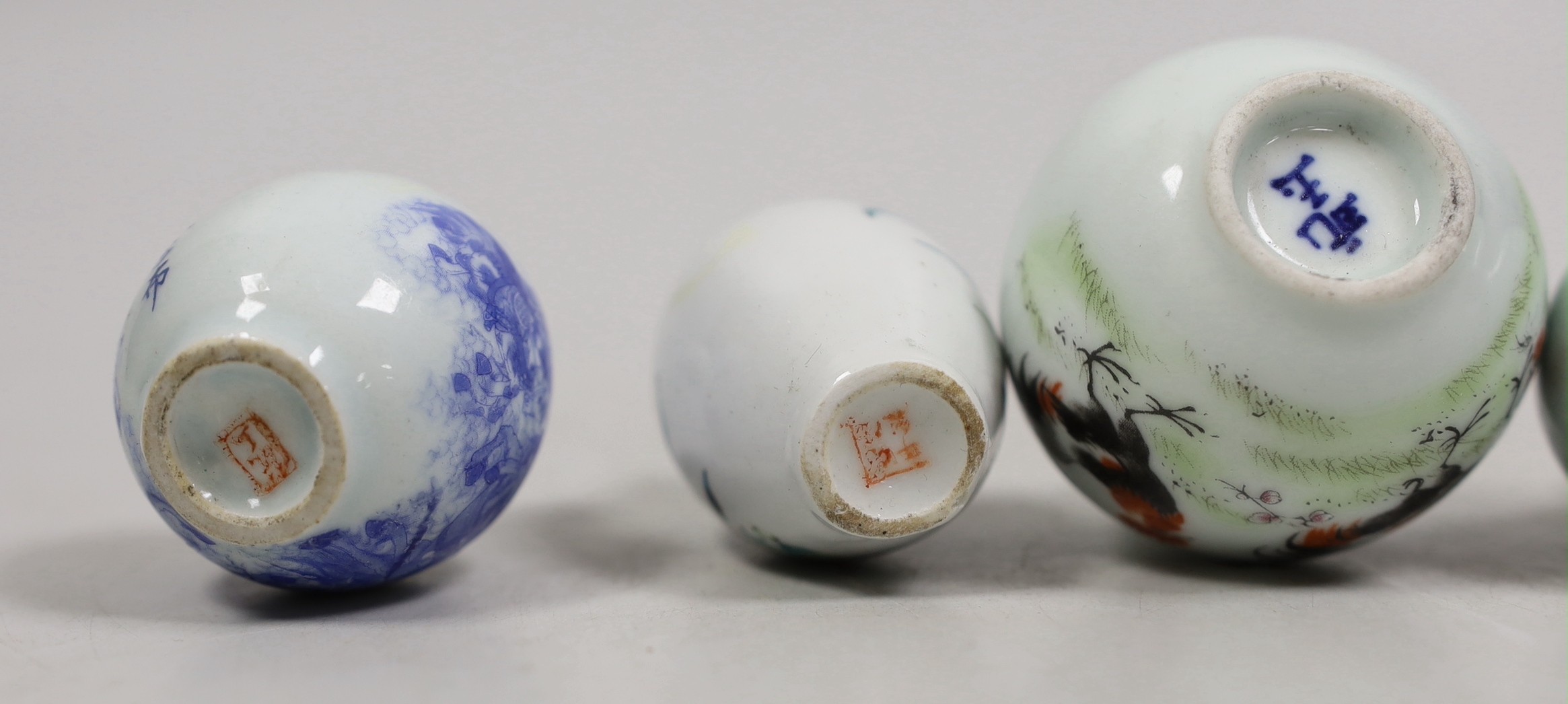 Five Chinese porcelain snuff bottles
